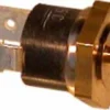 Close-up of the Lelit MC031 125 °C Steam Thermostat, showing its brass hex nut, threaded stud, and dual metal electrical connectors for temperature sensing in steam applications. © 2025 1st-line.com